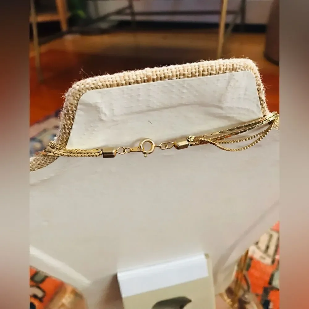 Vintage multi-chain layered gold tone long necklace